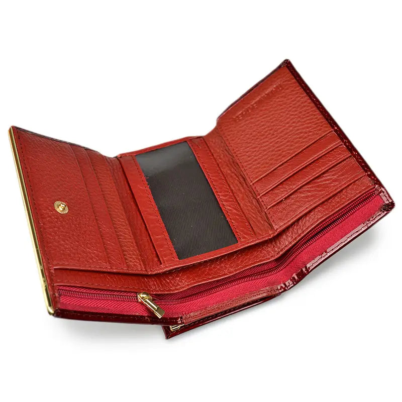 Red textured leather trifold wallet with retro crocodile pattern, gold-tone clasp, and zippered compartment.