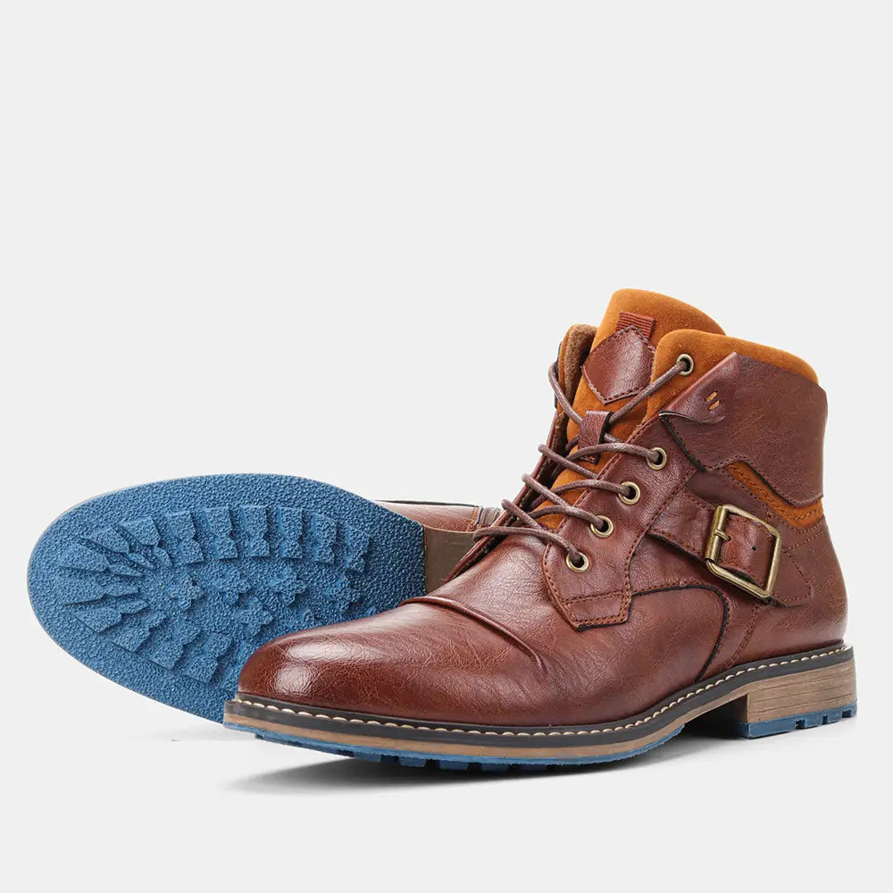 Men’s leather martin boots featuring brown leather with tan accents brass buckle and blue rubber sole.