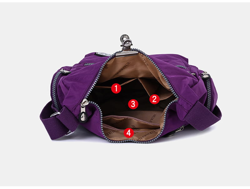 Purple waterproof multi pocket nylon crossbody shoulder bag with silver zippers and brown interior lining.