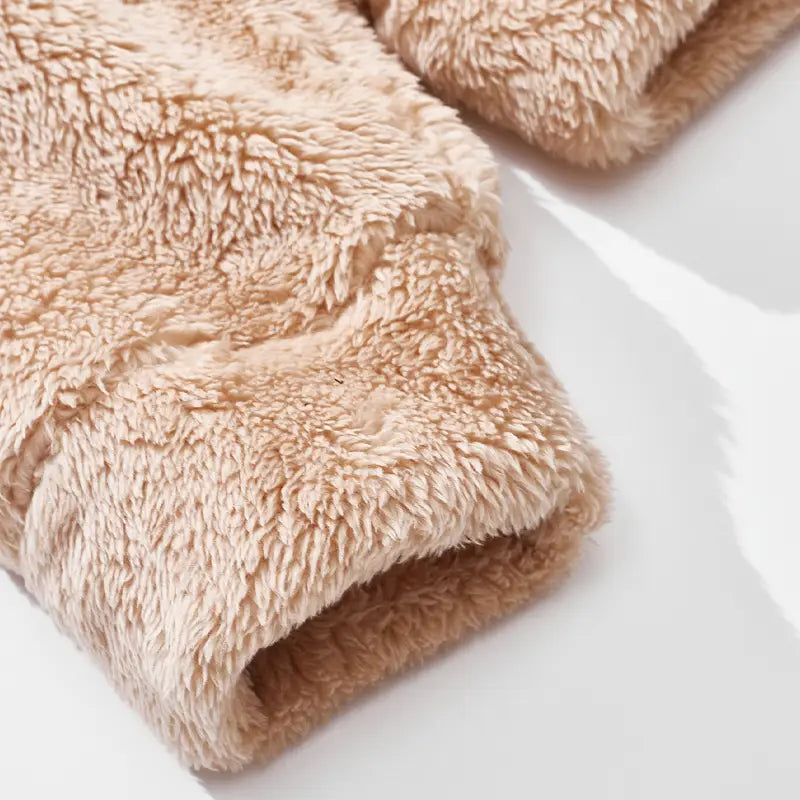 beige plush fleece lined cuff of men’s fleece lined loose zip up hooded jacket showcasing soft lining and comfortable material.