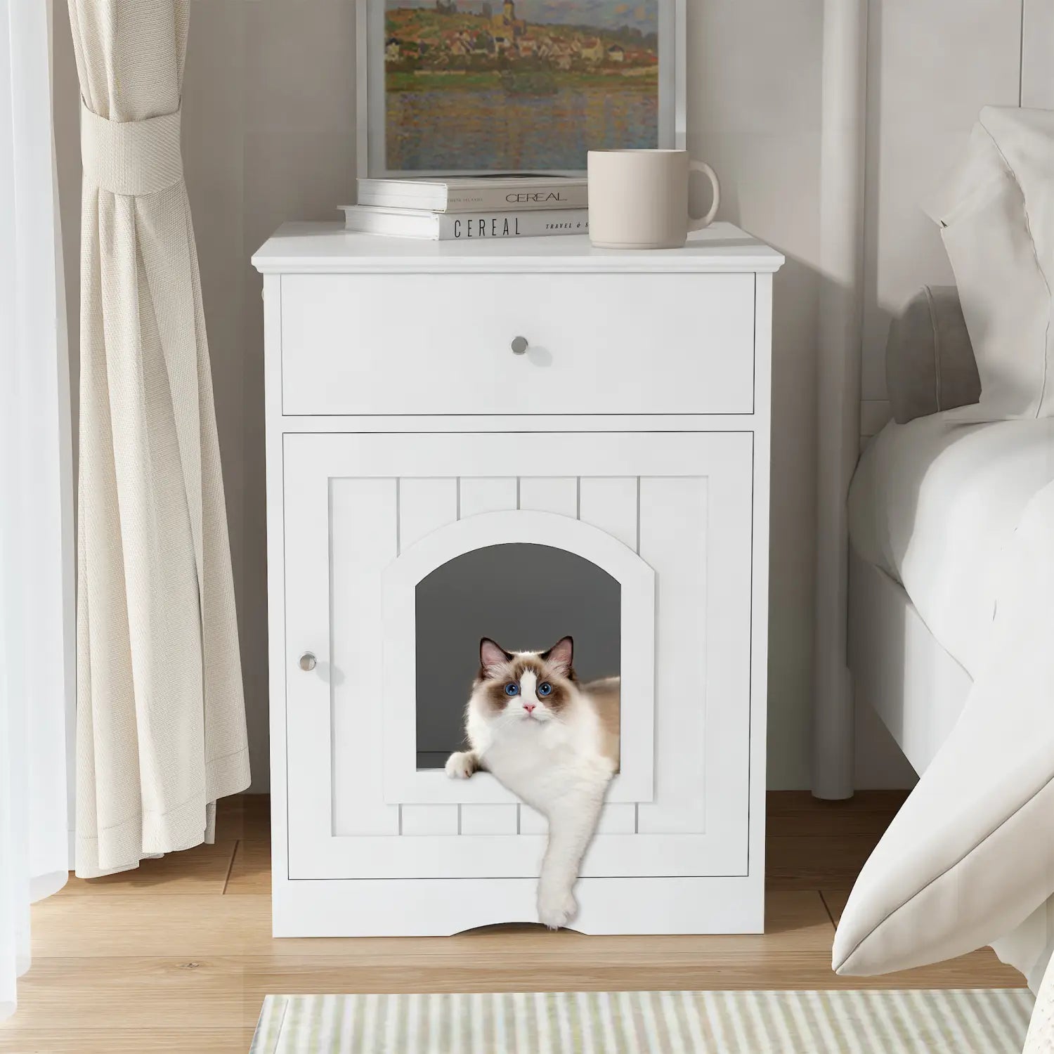 white wooden cat litter box enclosure with arched entrance decorative paneling and a built-in drawer for convenient storage