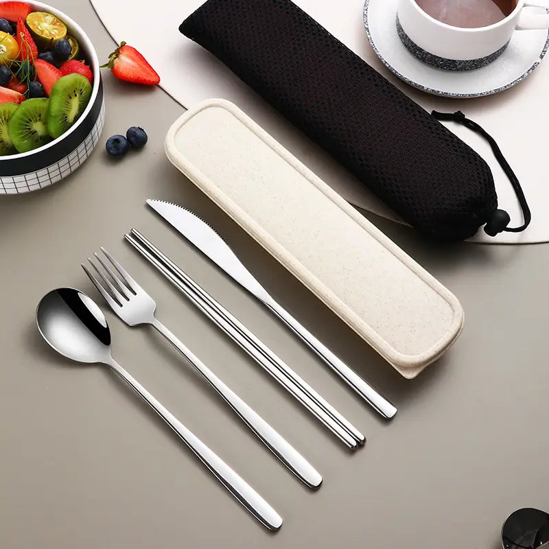 stainless steel portable cutlery set with a sleek reflective finish and matching beige carrying case