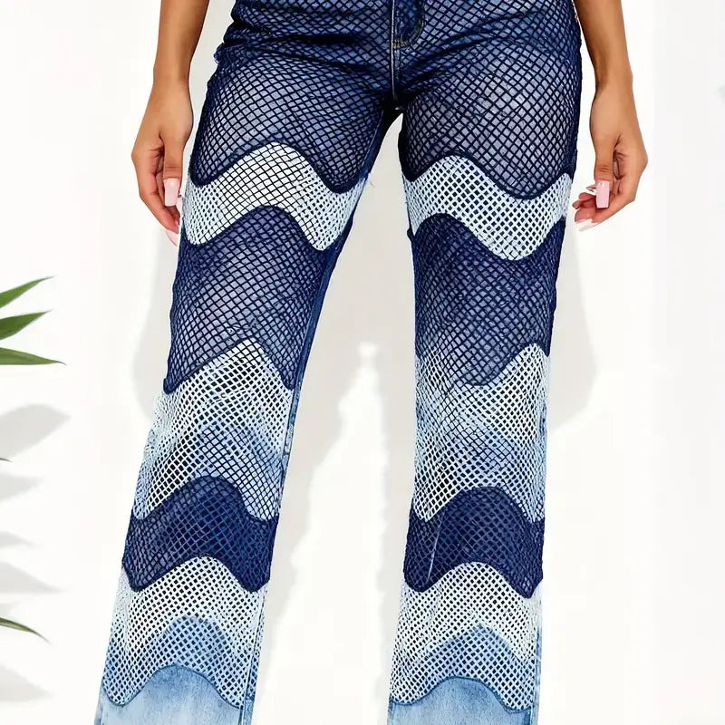 Blue denim straight leg jeans medium wash featuring a bold wavy mesh overlay in varying shades of blue and white with a high waisted geometric design.