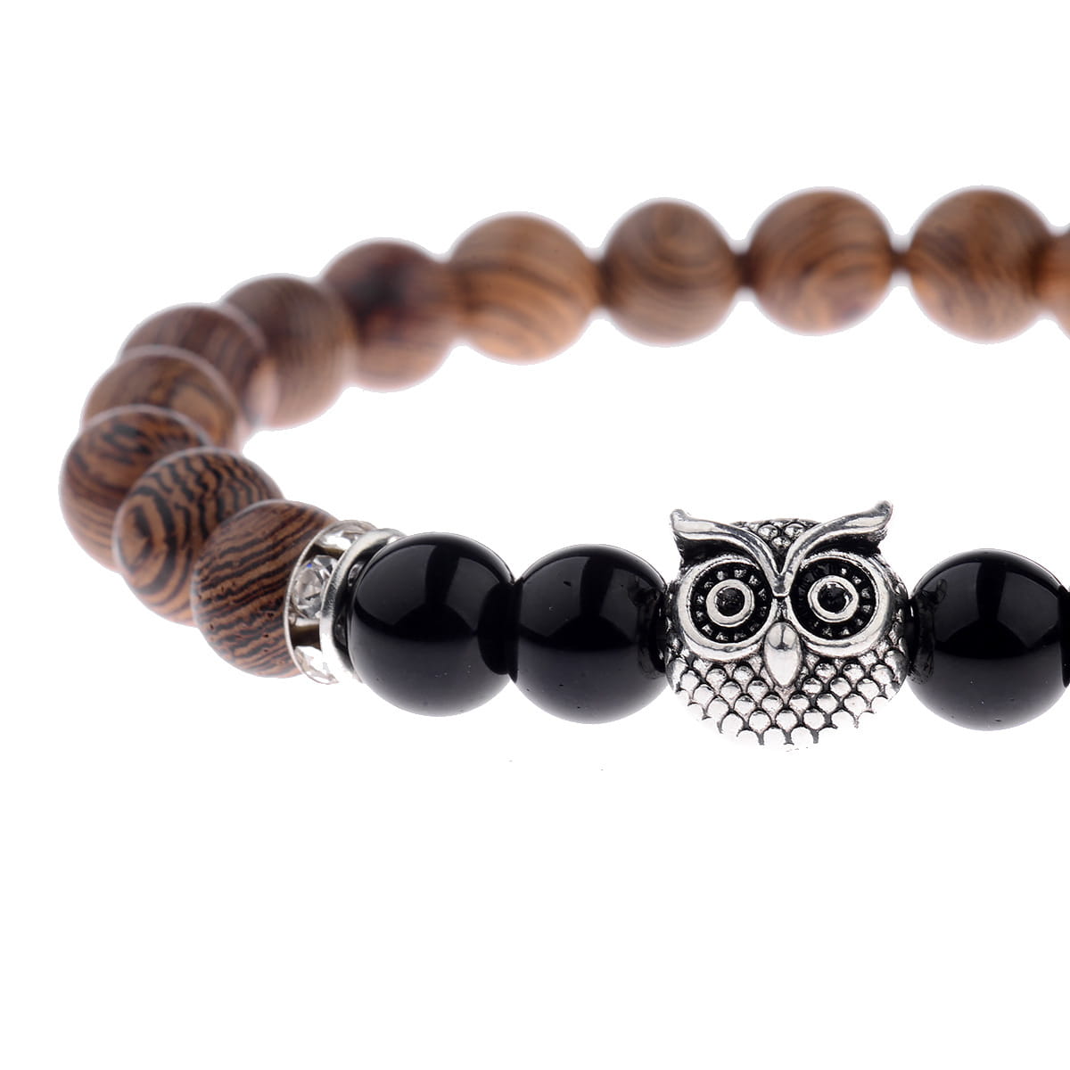a silver owl charm adorns a crystal owl charm wood and onyx beaded bracelet featuring dark brown wooden beads and glossy black onyx stones