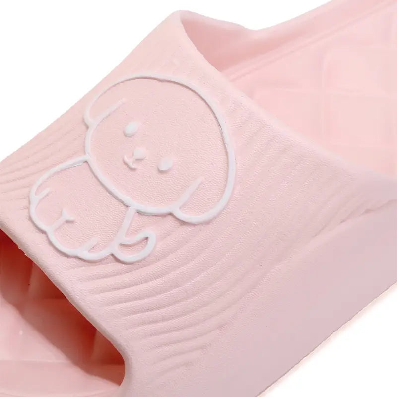 pink rubber dog cartoon slide sandal with white embossed puppy design made of non slip eva for house use