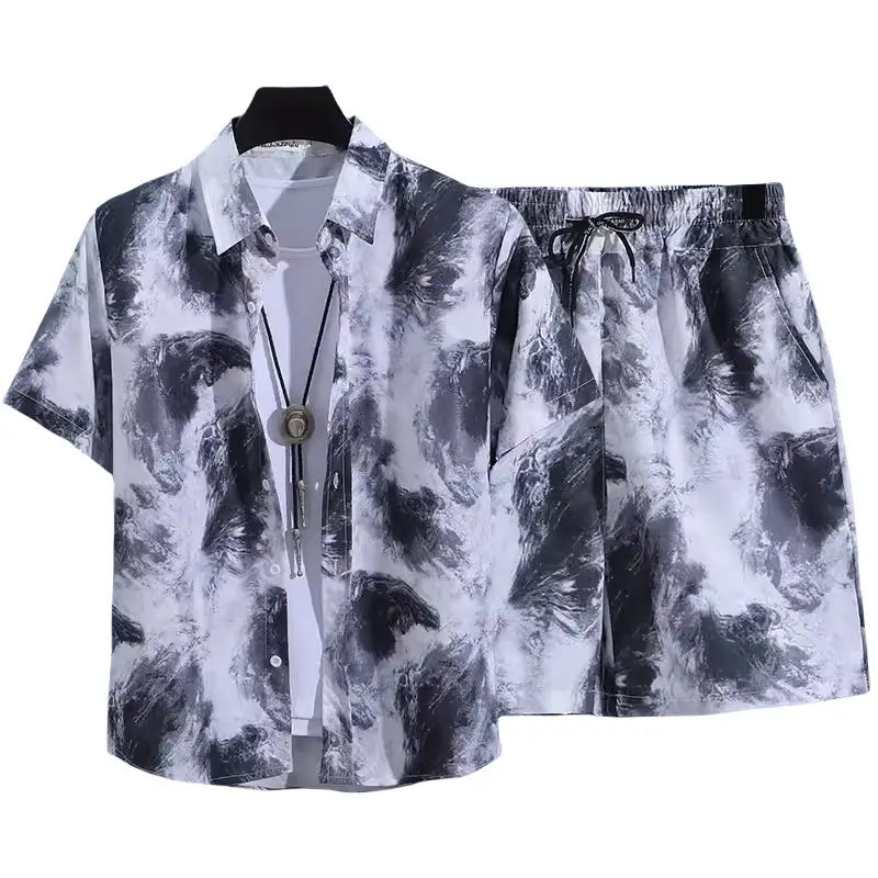 Floral shirt and shorts set featuring a black and white abstract tie-dye pattern with short sleeves and button-up front designed for casual tropical wear.
