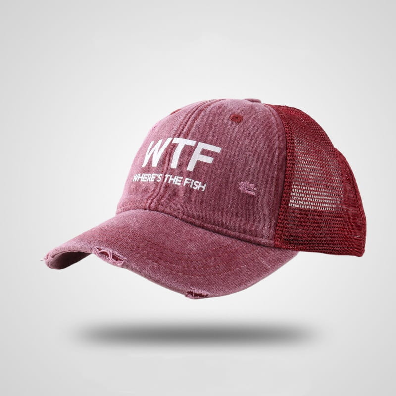 A distressed maroon fishing trucker hat with white embroidered wtf wheres the fish text and mesh back.
