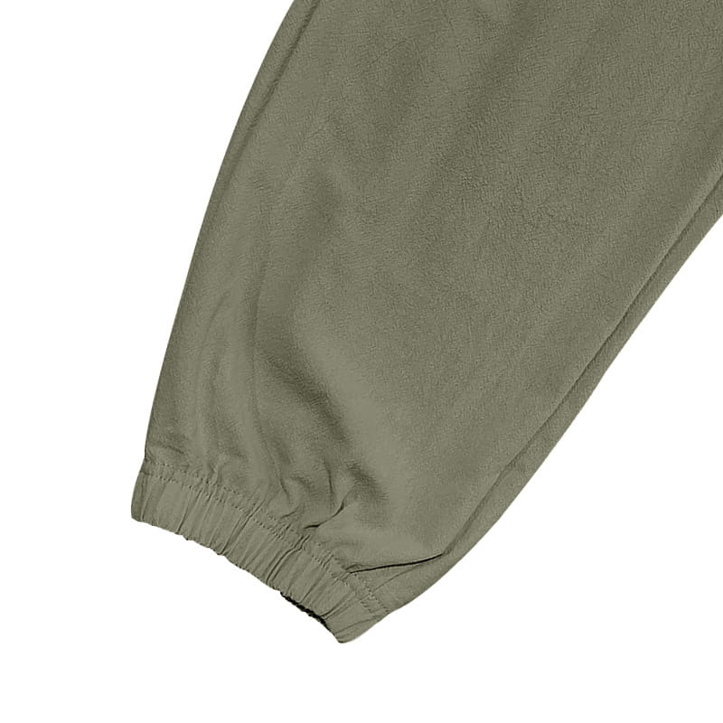 Men linen cargo pants drawstring cuffed ankle in olive green with soft textured fabric and elasticated cuffs.