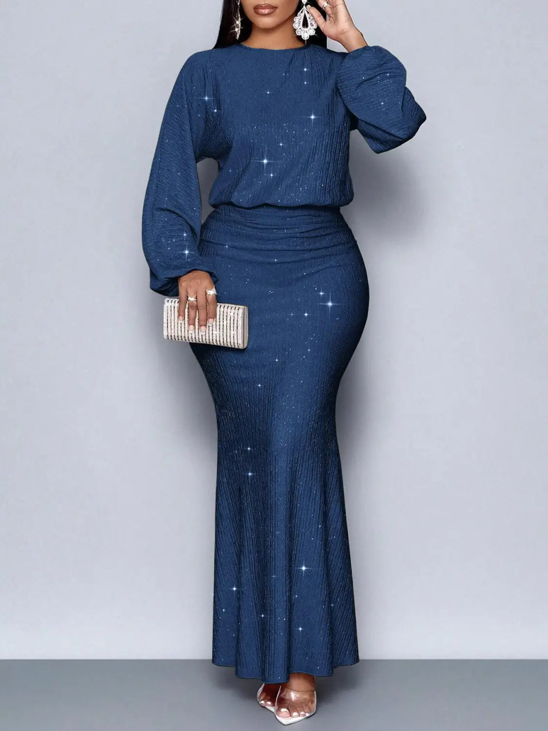 A navy blue sequin lantern sleeve mermaid two piece set with a sparkling ribbed texture and long sleeves.