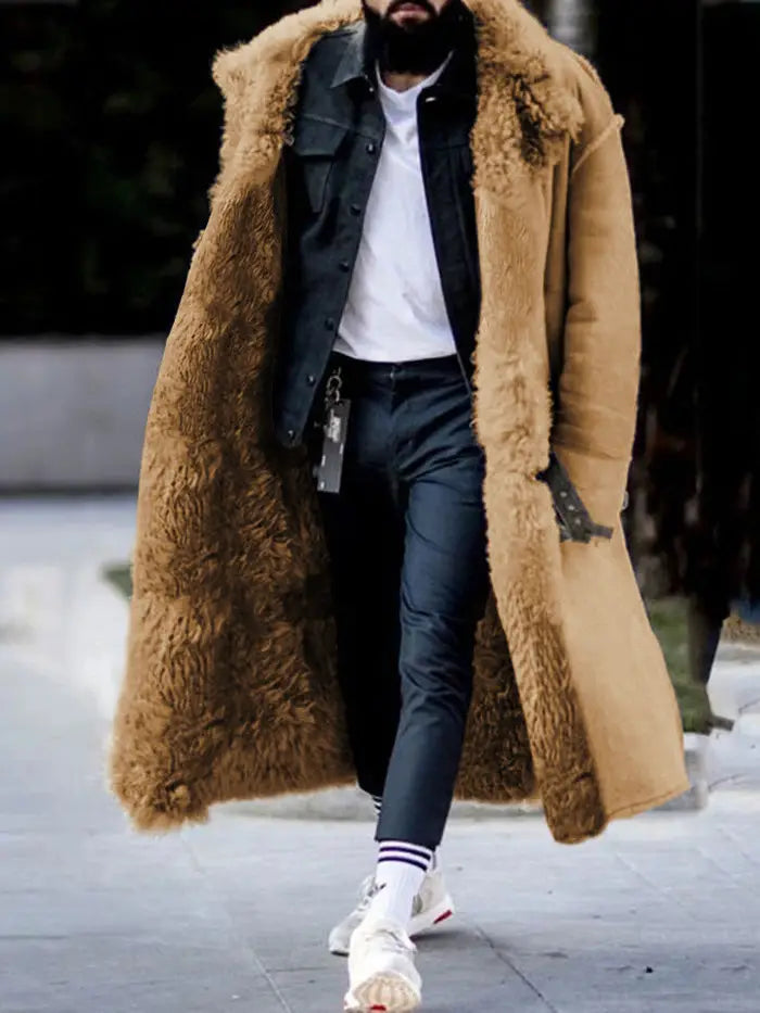 A plush tan furry long shearling winter coat with a thick fluffy collar and cuffs.