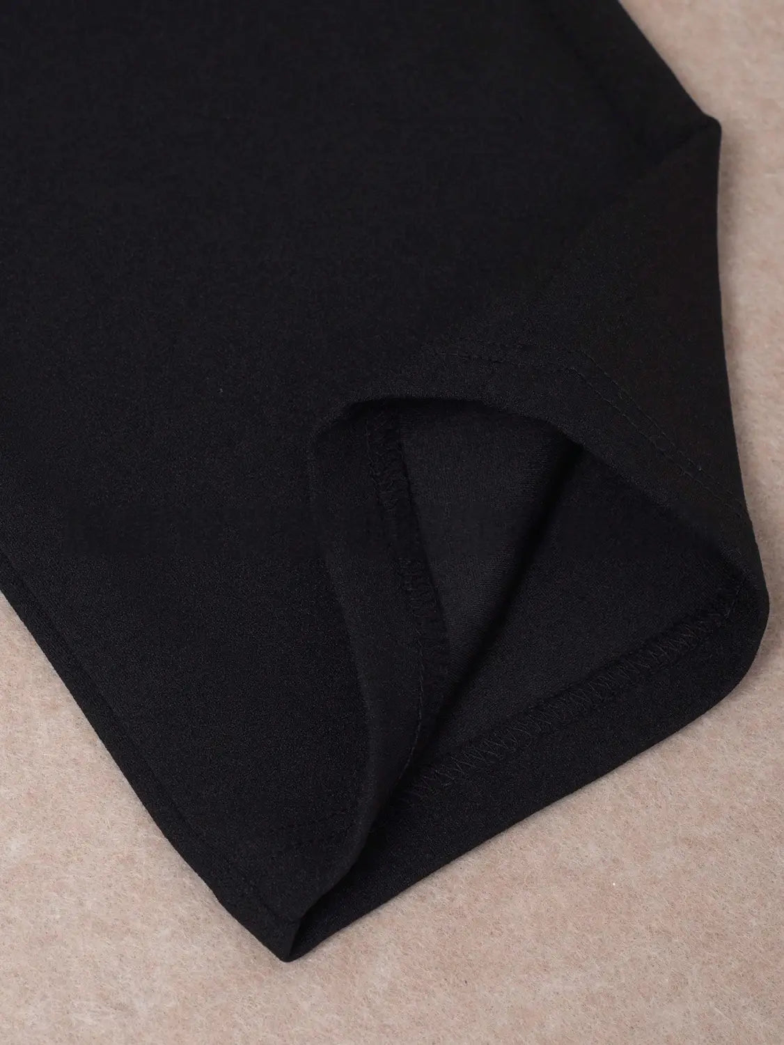 Black high waist straight leg trousers plus size featuring soft textured fabric with a smooth finish and a neatly stitched hem.