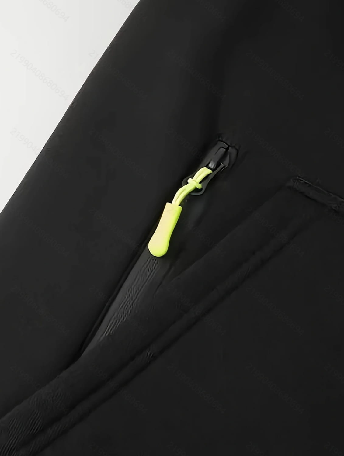 men’s sport casual fleece lined black jacket with a bright neon yellow zipper pull suitable for outdoor activities