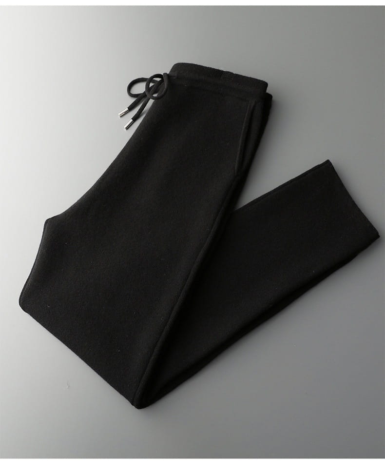 black drawstring wool cardigan sweatpants with soft smooth fabric and a neatly tied cord at the waist for men