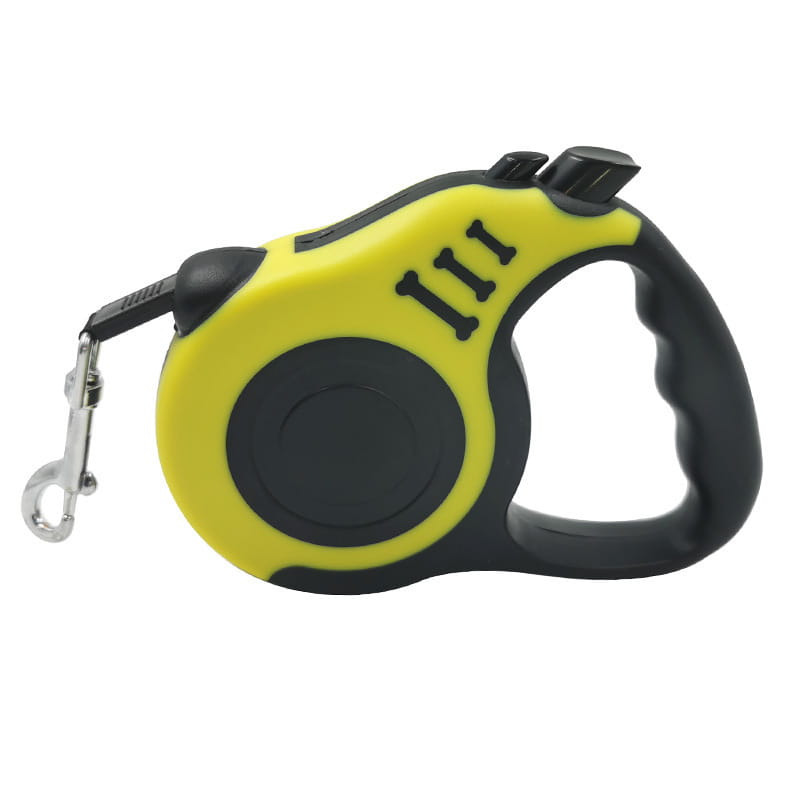 Retractable dog leash with ergonomic textured grip handle in bright yellow and black featuring a bone-shaped logo.
