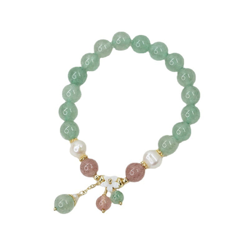 A delicate Korean floral green strawberry crystal beaded bracelet featuring jade and pink gemstones with a white pearl accent and gold-toned metal details.