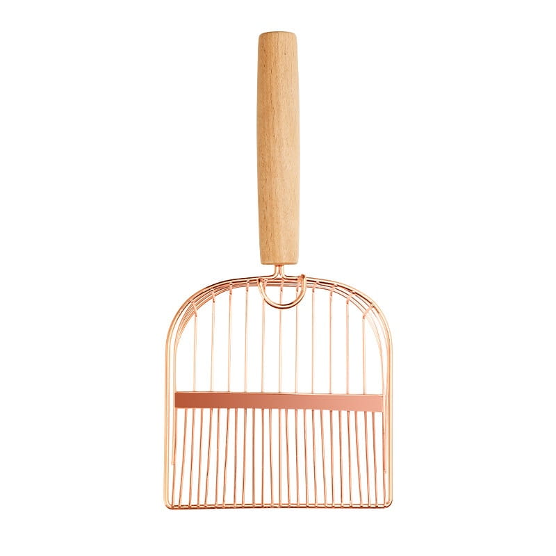 Pala para arena sanitaria de gato de metal color rosa dorado con mango de madera clara y barra de acento horizontal.