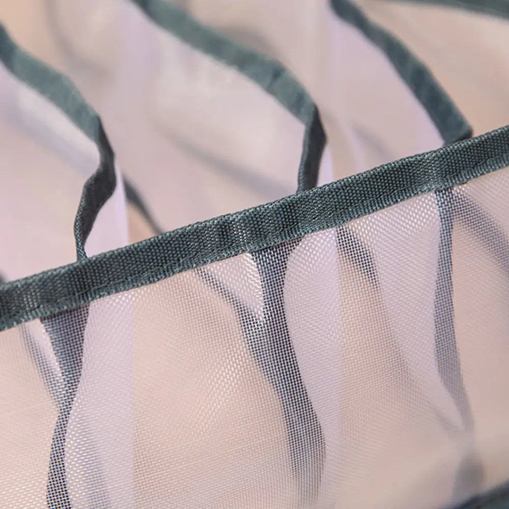 a delicate translucent mesh underwear organizer with dark green reinforced edges and subtle vertical stitching for 7grid 11grid drawer storage box.