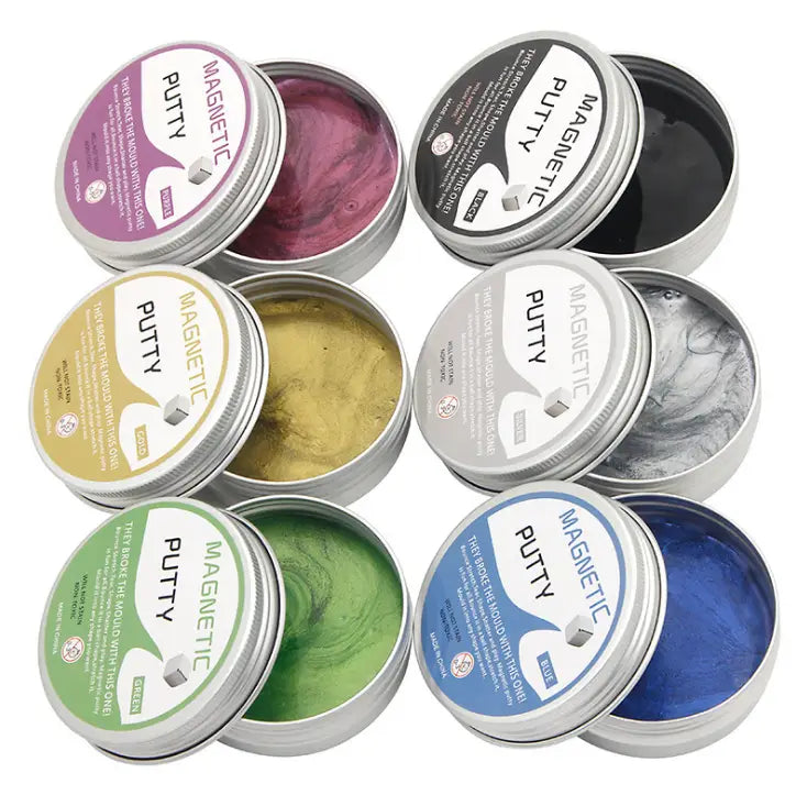 A collection of magnetic putty stress relief toys in metallic and solid colorful hues each contained within a labeled silver tin.