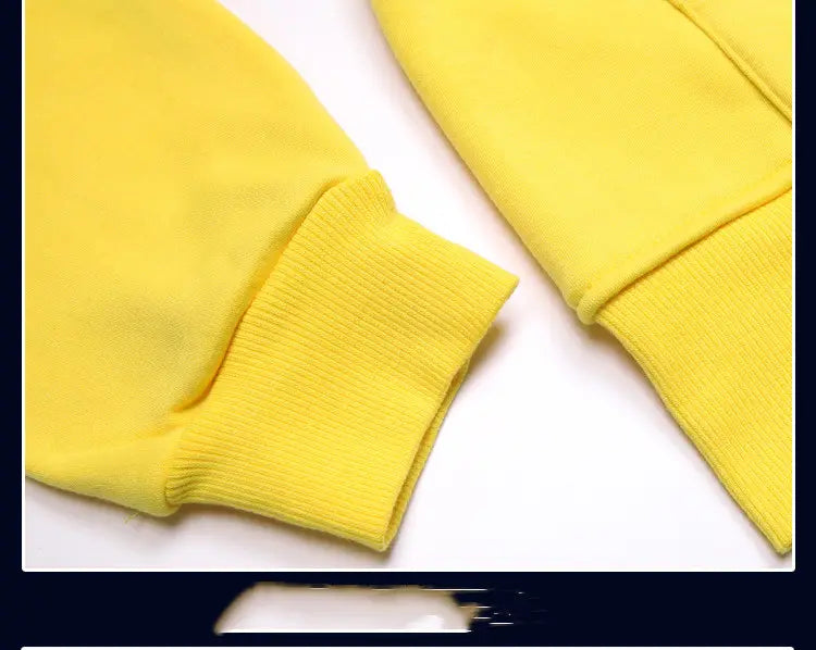 Men’s contrast trim fleece zip hoodie featuring bright yellow ribbed knit cuffs on a sweatshirt.