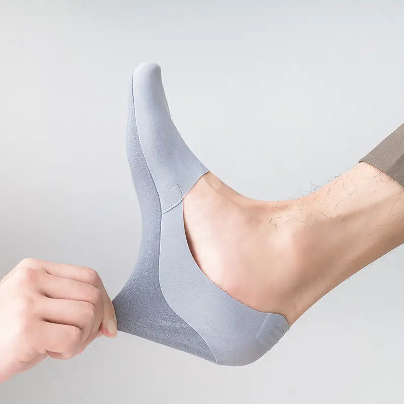 Light gray seamless men cotton invisible no show ankle sock with a smooth soft fabric finish.