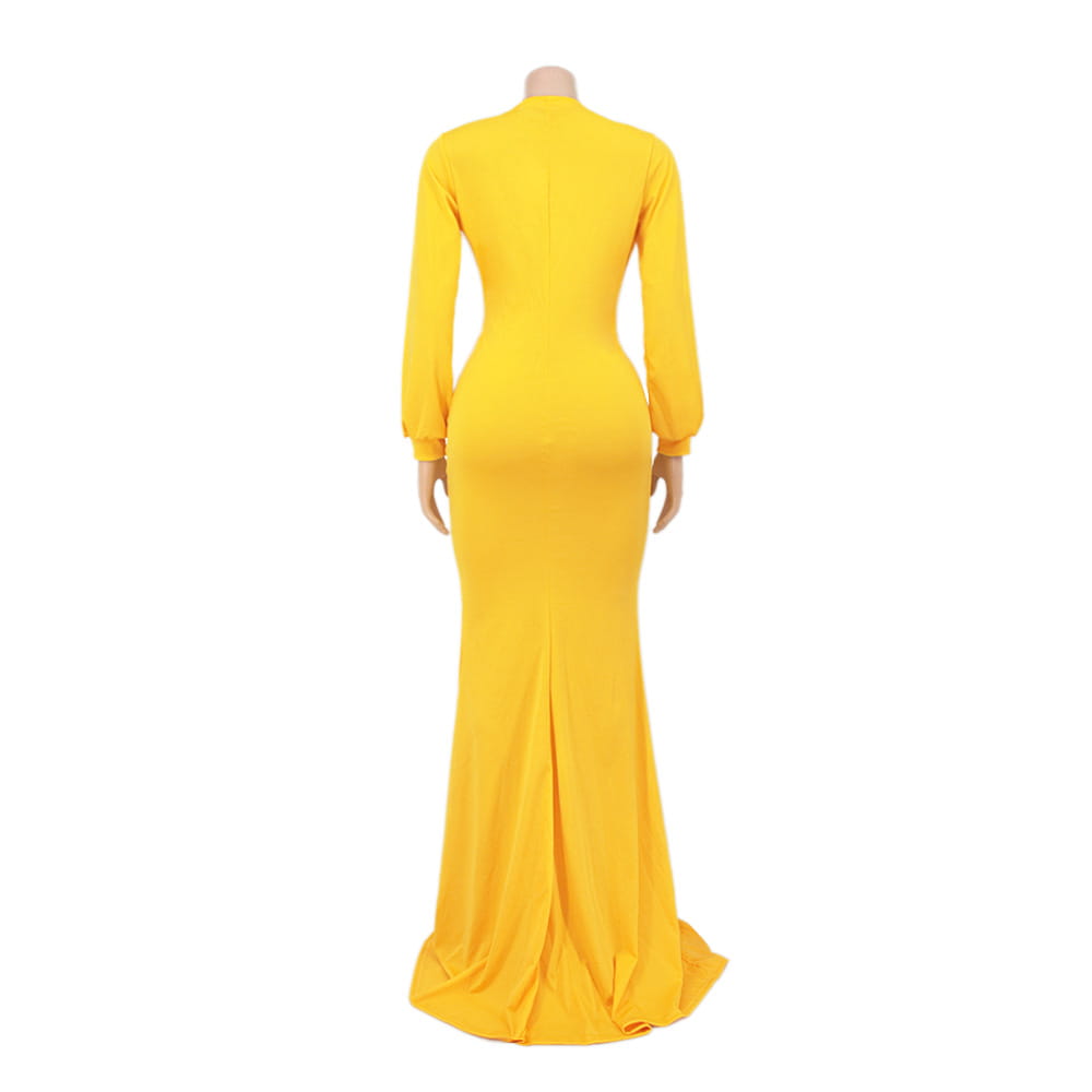 A vibrant yellow long-sleeved velvet v-neck evening dress with a fitted mermaid silhouette and high neckline.
