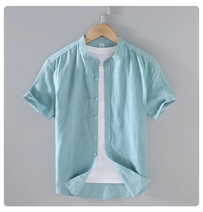 light blue men linen short sleeve shirt with mandarin collar and button-up front.