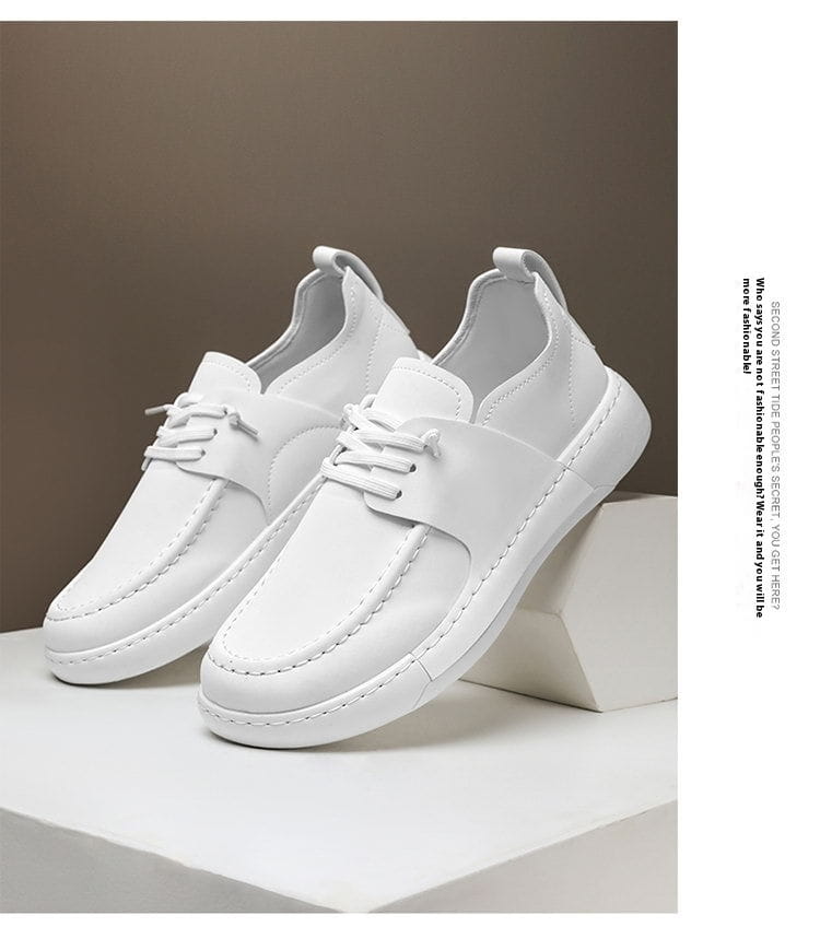Chaussures en cuir rétro britanniques élégance décontractée pour homme en cuir blanc, fermeture à lacets et détails de couture minimalistes.