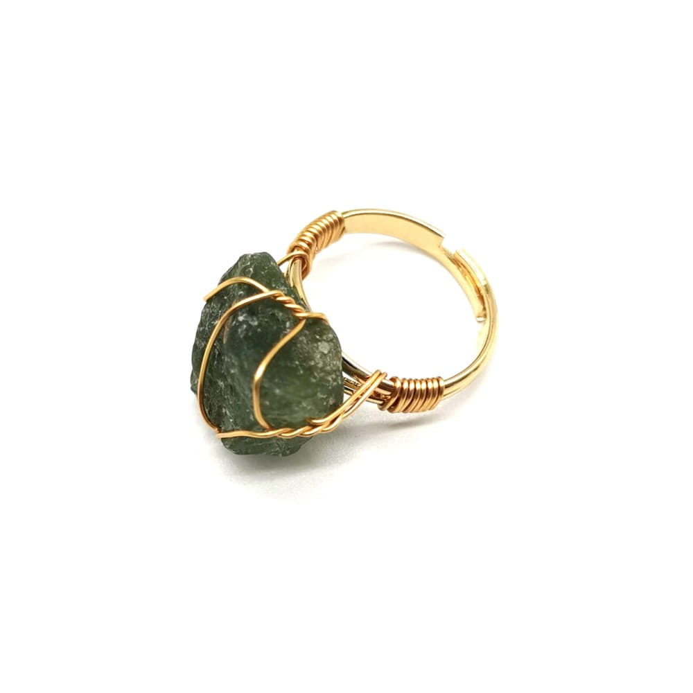 Handcrafted raw gemstone gold wire wrapped adjustable ring featuring a raw dark green moss agate stone.