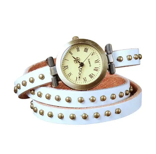 white leather wrap watch bracelet with gold-tone studs and a vintage-style face
