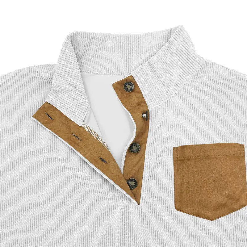 Slim fit corduroy patchwork pullover in white with tan suede accents on the collar, placket, and pocket.