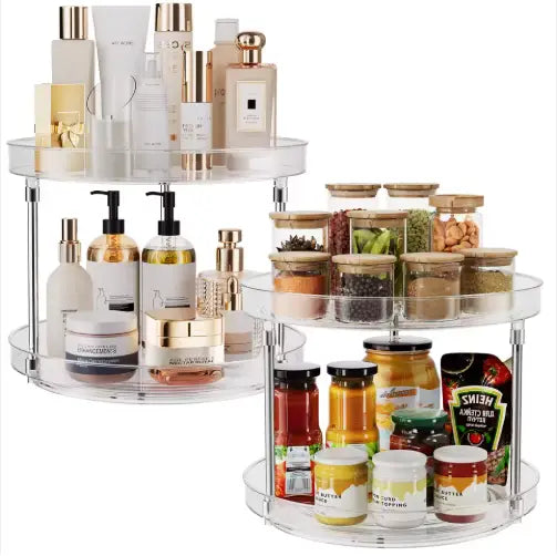 Clear acrylic two-tier rotating kitchen organizer with transparent shelves and metallic central supports in a pack of two turntable spice racks.