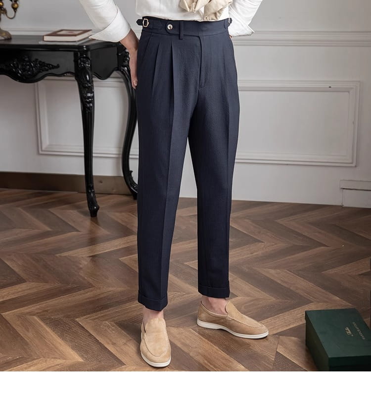 Dark navy slim fit pleated summer linen suit trousers with a tailored fit and belt loops.