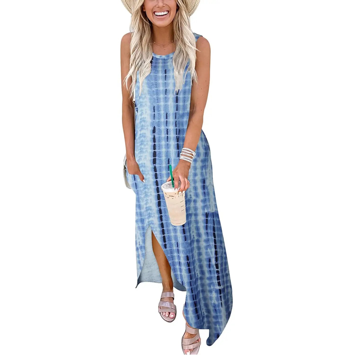 tropical print sleeveless irregular hem maxi dress featuring a flowing blue tie-dye fabric with a high slit and sleeveless design