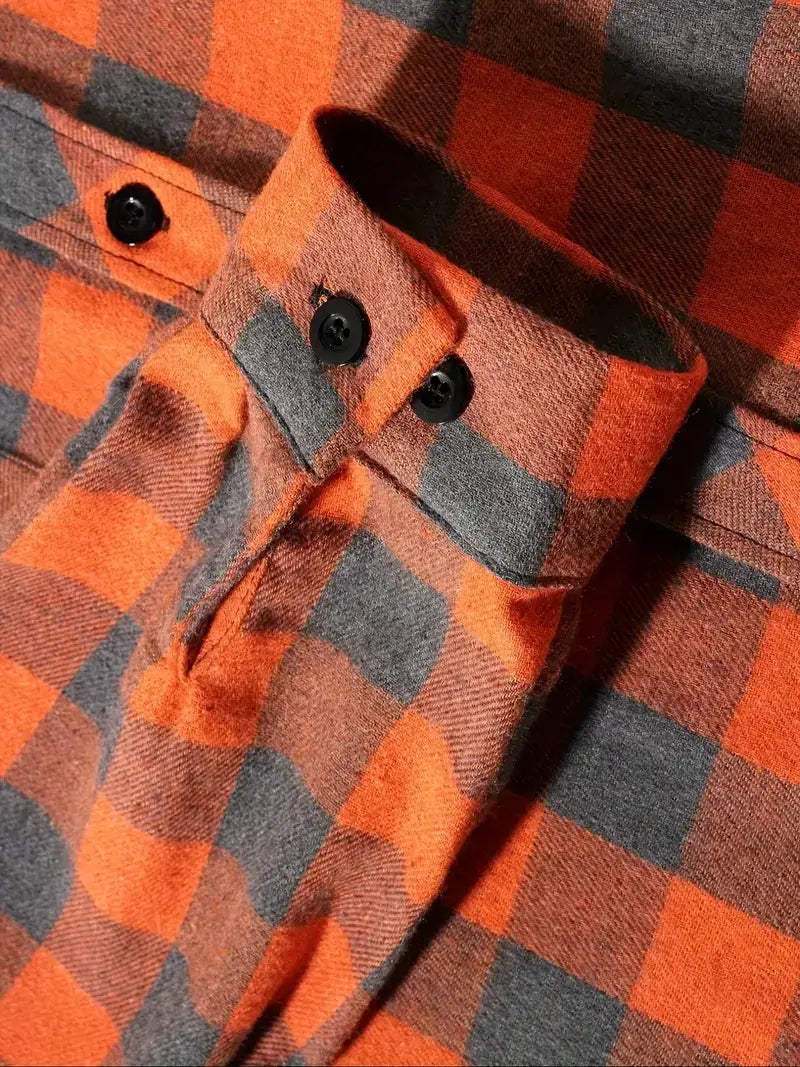 Men’s plaid hooded flannel shirt in orange and gray with black buttons made of soft flannel material.