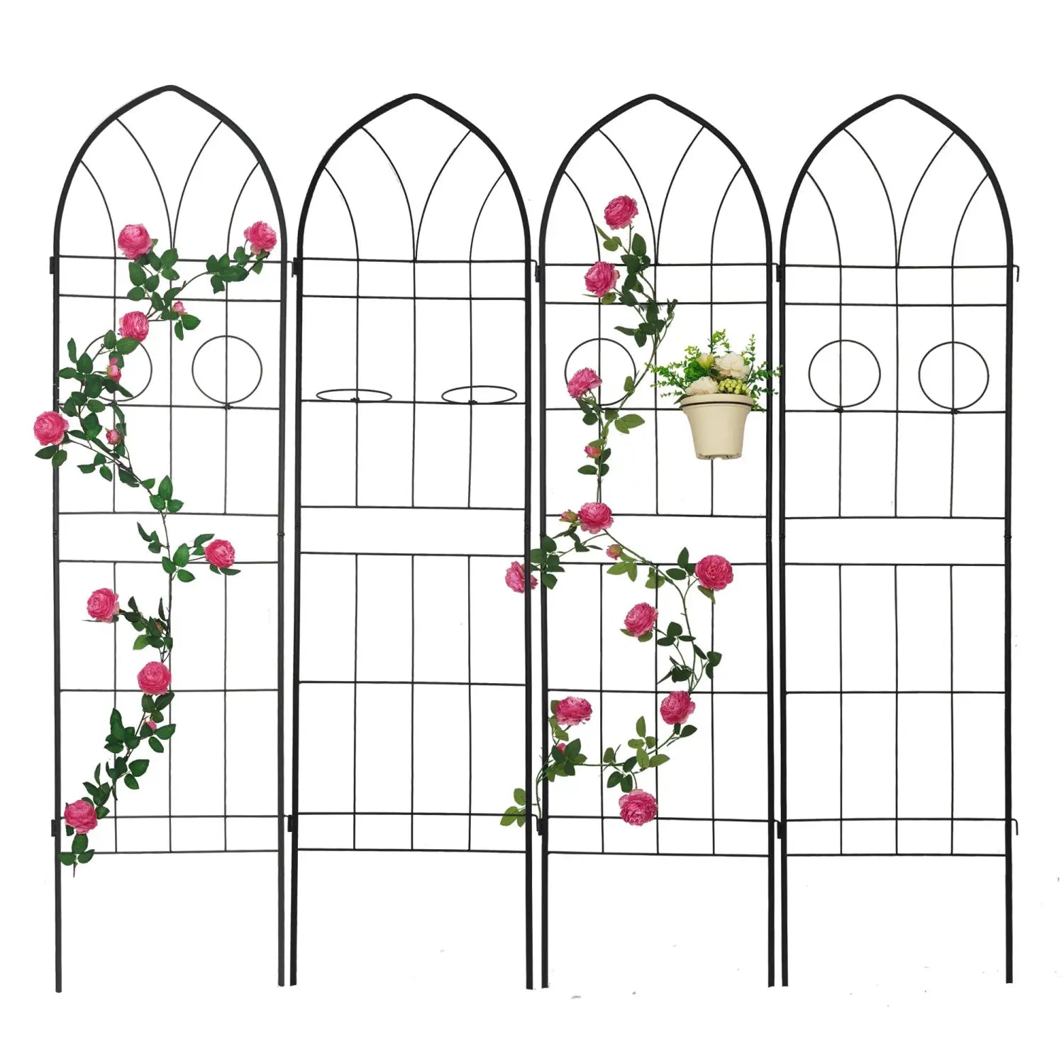 Black metal garden trellis with arched top and circular accents adorned with pink roses climbing its frame from a 4 pack designed for climbing plants.