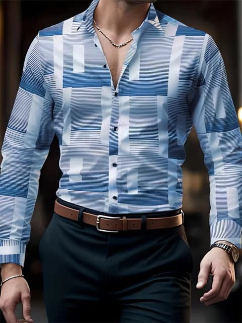 A man wearing a men’s premium geometric and printed long sleeve button down shirt in blue and white pattern.