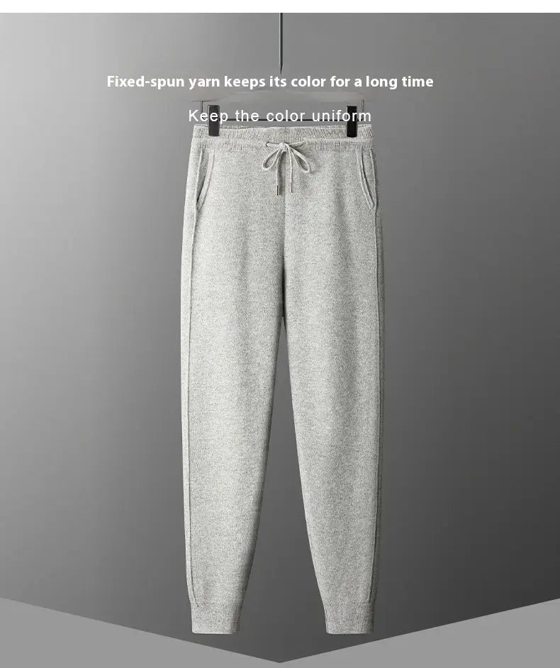 Men’s wool harem pants high waist casual joggers in gray with a drawstring waistband and ribbed cuffs.