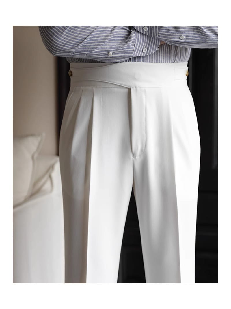 Men’s tailored white pleated wool straight leg trousers with gold toned belt loops and a tailored fit.
