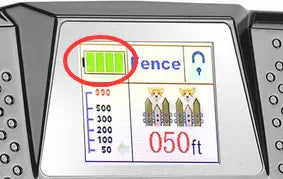 The digital display of the black 2-in-1 wireless dog fence and remote training collar shows battery level, fence length in feet, and icons for three adjacent fences.