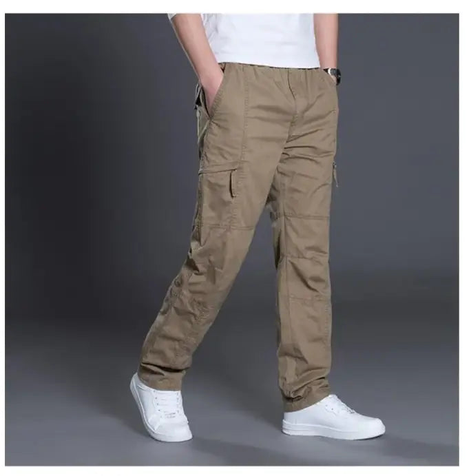 Men’s relaxed fit cargo pants in khaki with multiple pockets made from pure cotton for comfort and durability.