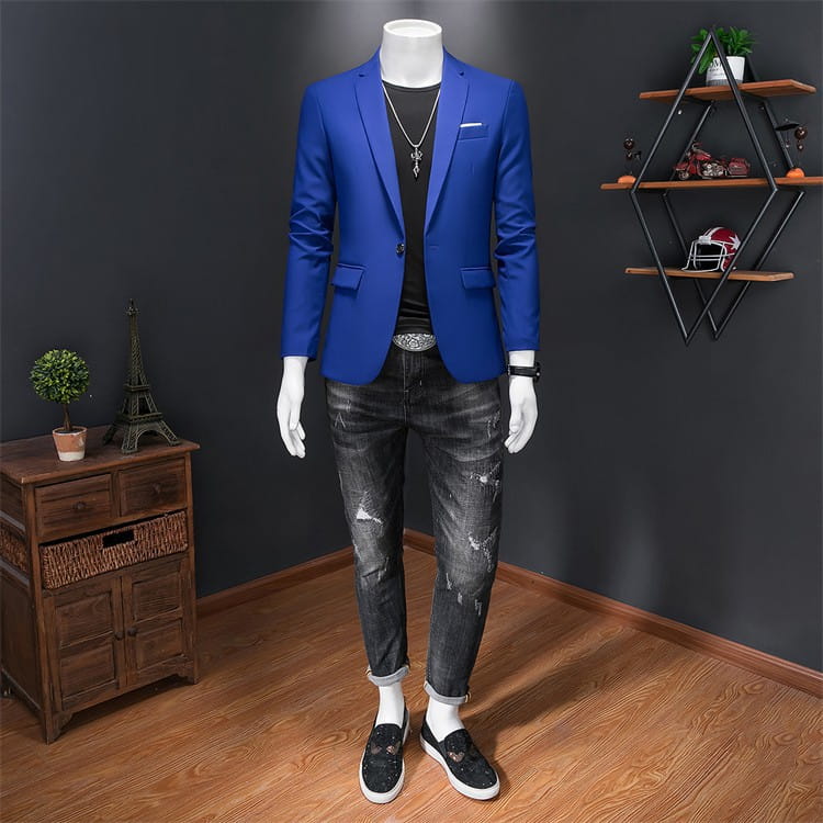 Chaqueta de vestir empresarial de pana azul vibrante con ajuste slim, solapas a pico tipo muesca a medida y diseño de una sola botonadura.