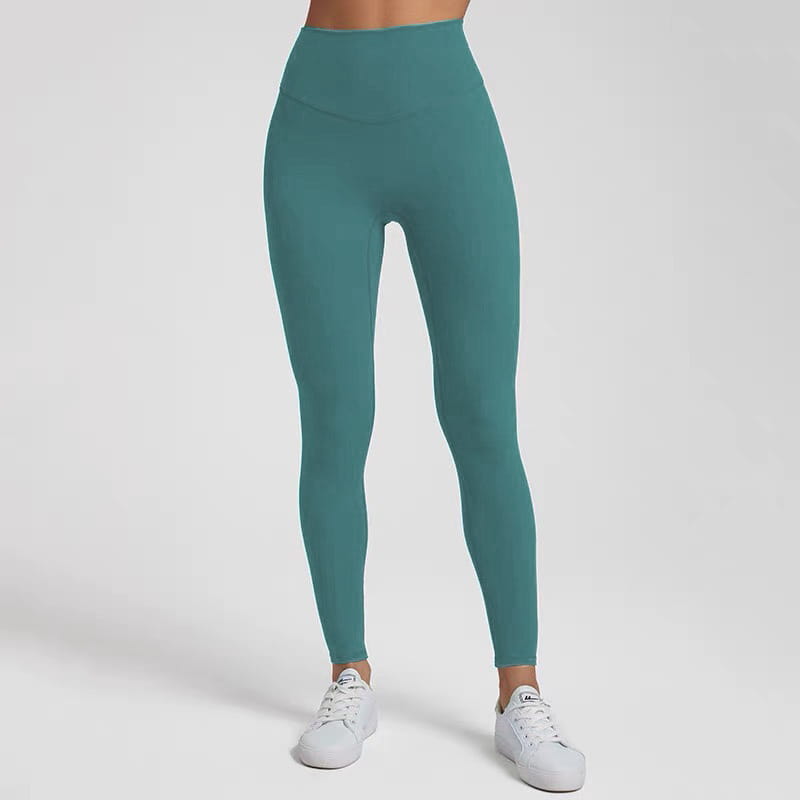 Teal high waisted stretch fitted leggings made of smooth stretchy fabric.