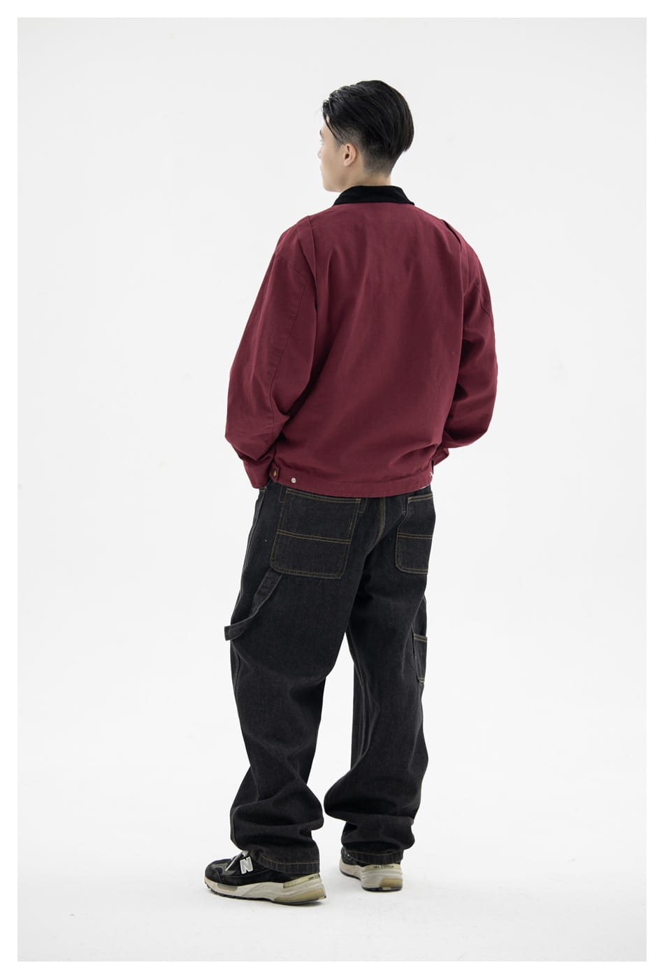 Maroon retro washed Detroit bomber jacket for men with black collar paired with dark denim cargo pants.
