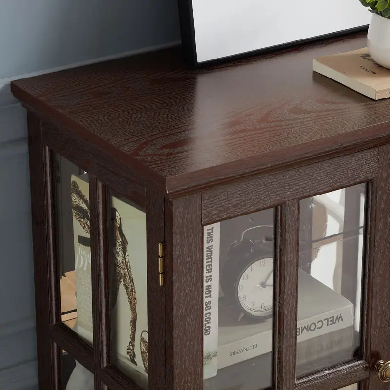 led curio display cabinet with adjustable shelves featuring dark brown wooden frame glass paneled doors and gold toned hardware for elegant storage and display