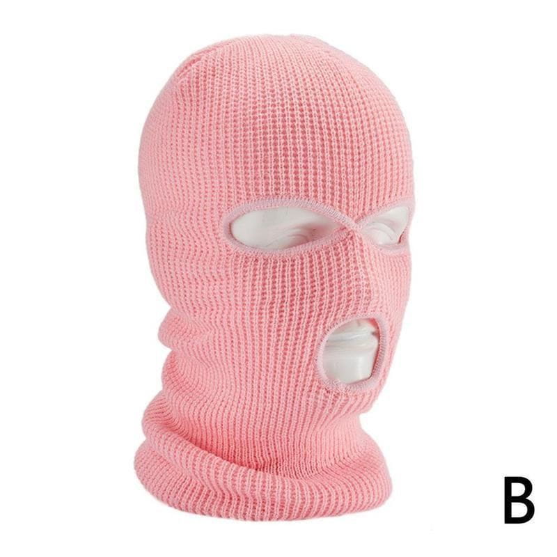 Bonnet cagoule tricoté rose, réalisé dans une matière chaude, avec trois ouvertures pour les yeux, conçu pour la pratique du cyclisme