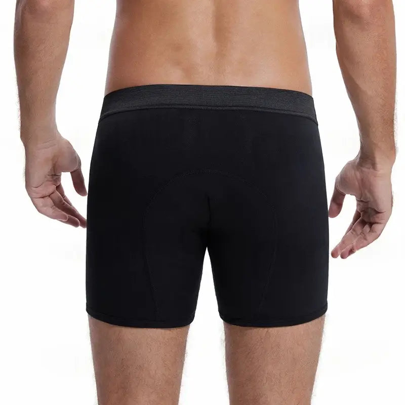 Caleçons boxers moulants athlétiques pour incontinence masculine noirs à absorbance, avec une taille élastique grise texturée, illustrée de face
