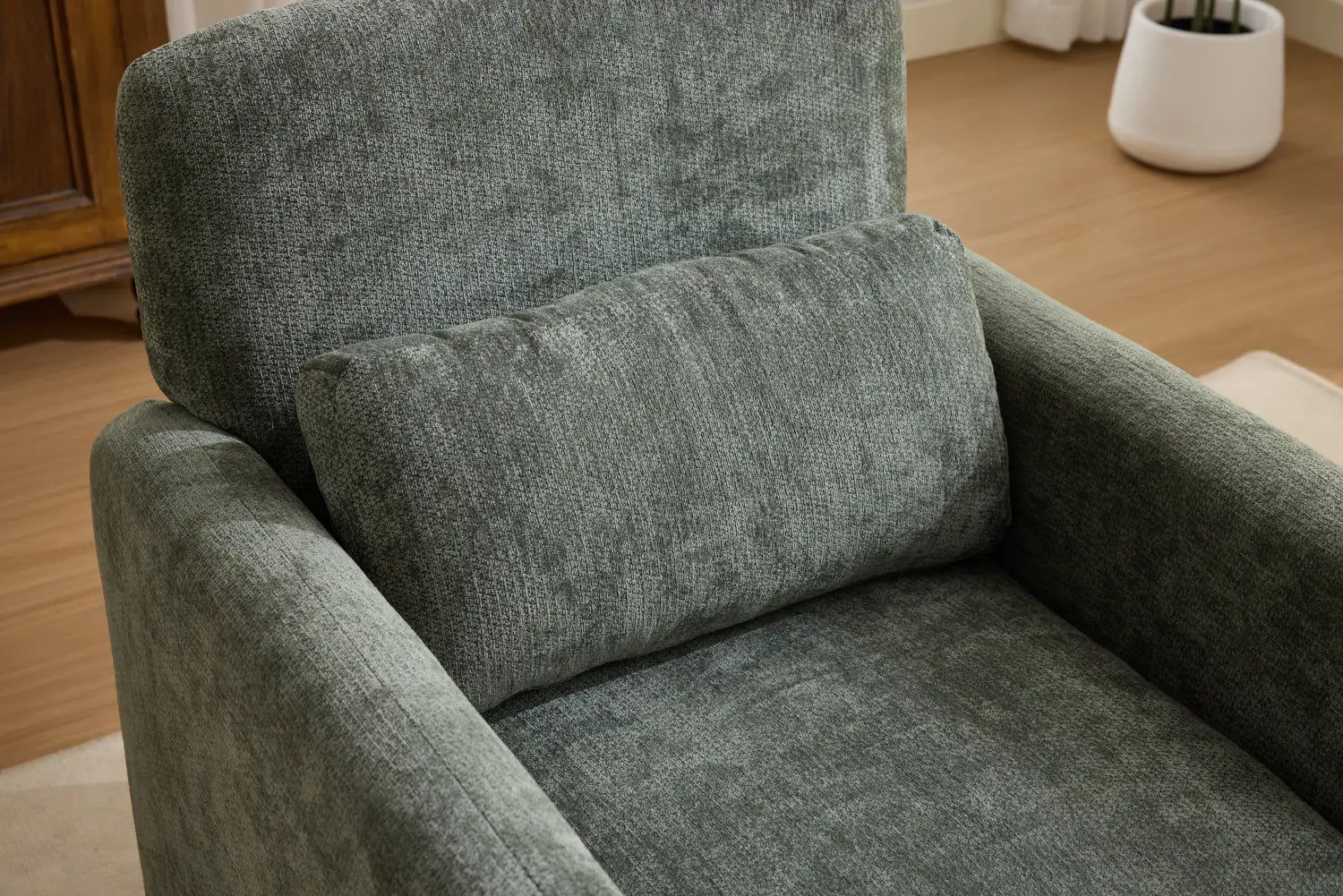 A cozy textured gray boucle fabric accent chair with a matching cushion featuring modern upholstered design.