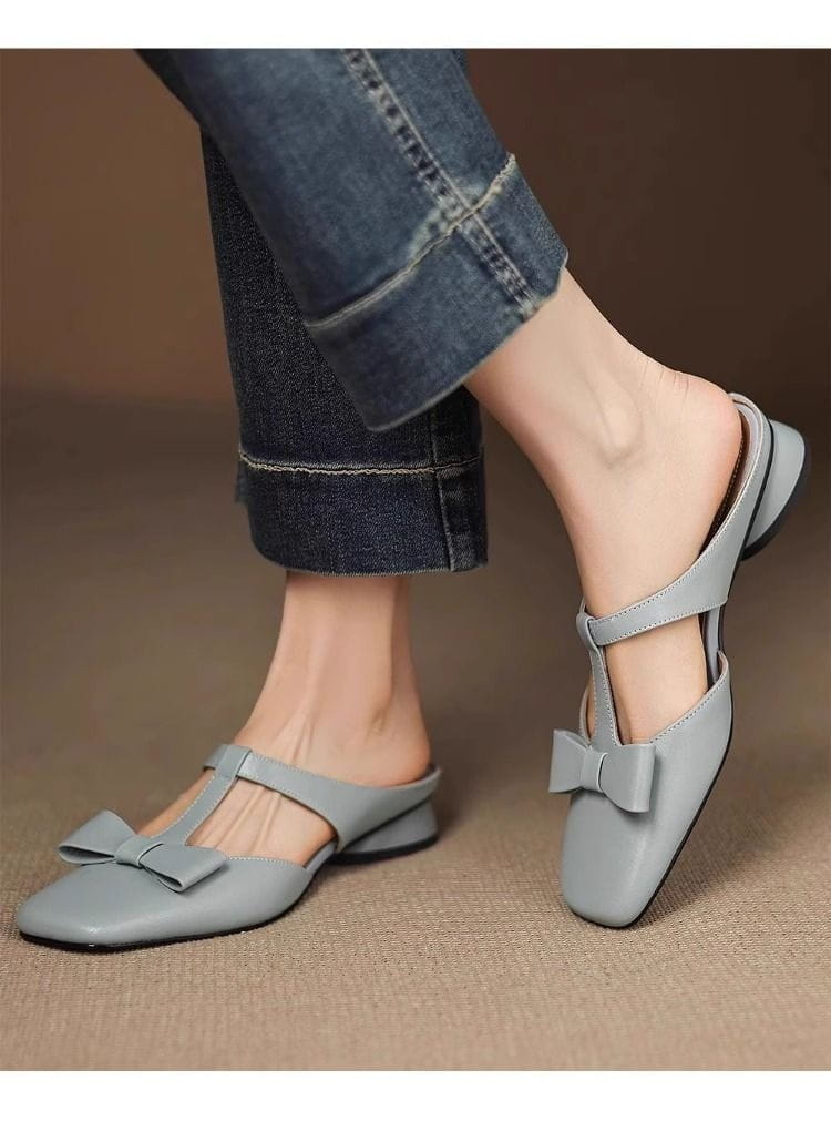 light gray leather mule flats for women with a square toe and decorative bow on the front