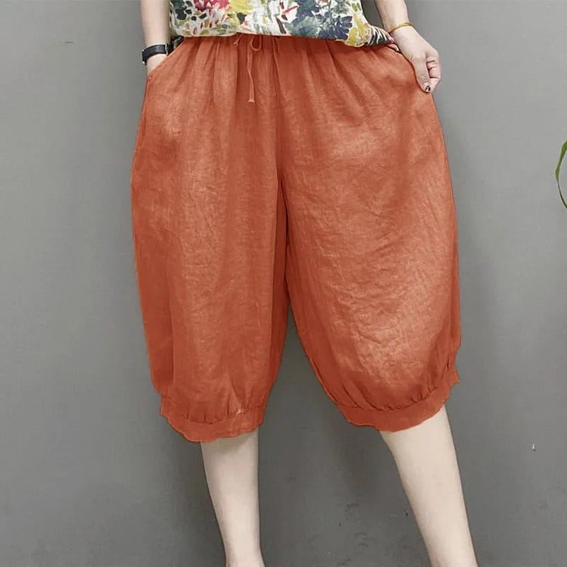 pantalones capri de lino estilo harén de talla grande en algodón color naranja con ajuste holgado, pretina ajustable con cordón y puños elásticos.