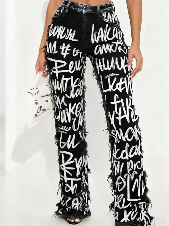 Black high-waisted wide leg jeans with bold white graffiti-style lettering and frayed distressed hems in a two tone distressed design.